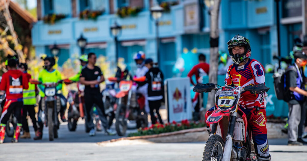 A rider stopped his dirt bike to a halt