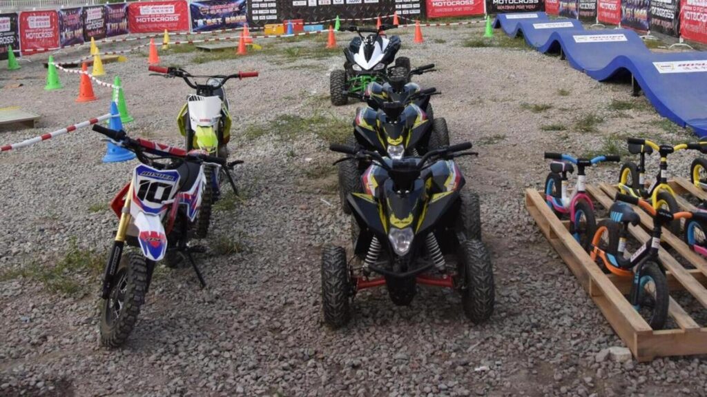 Bosuer ATVs and other off-road vehicles on the racing field